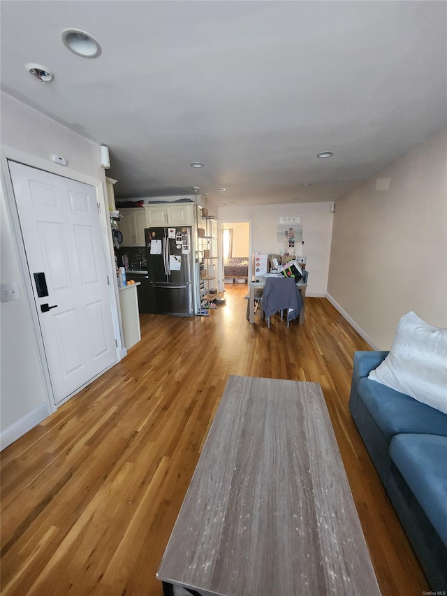 living room with wood-type flooring