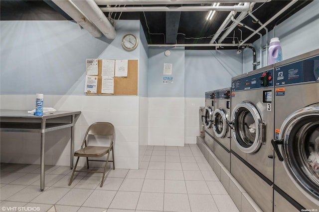 laundry room featuring washing machine and clothes dryer