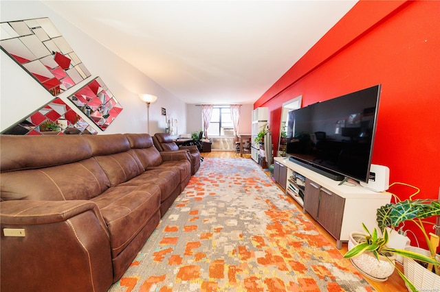 living room with light hardwood / wood-style flooring