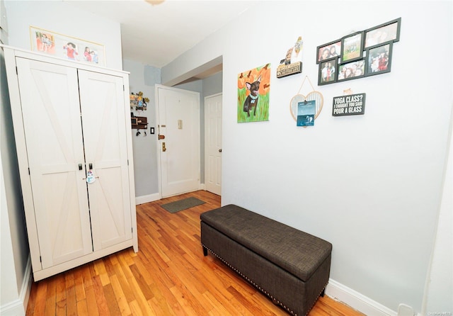 hall featuring light wood-type flooring