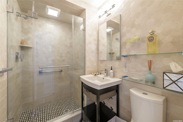 bathroom featuring walk in shower, tile walls, and toilet