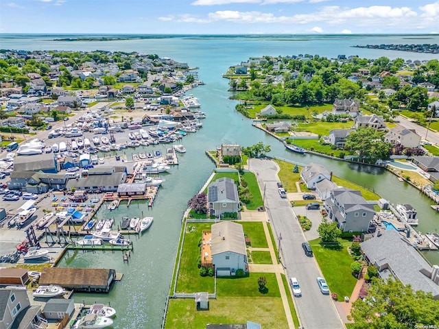 bird's eye view with a water view