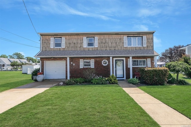 view of front facade with a garage and a front lawn