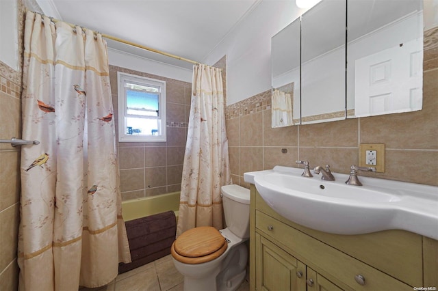 full bathroom with shower / bath combination with curtain, toilet, tile walls, and vanity