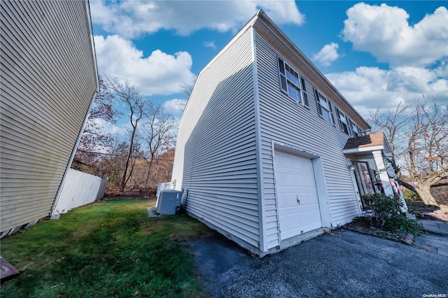 view of home's exterior with a garage