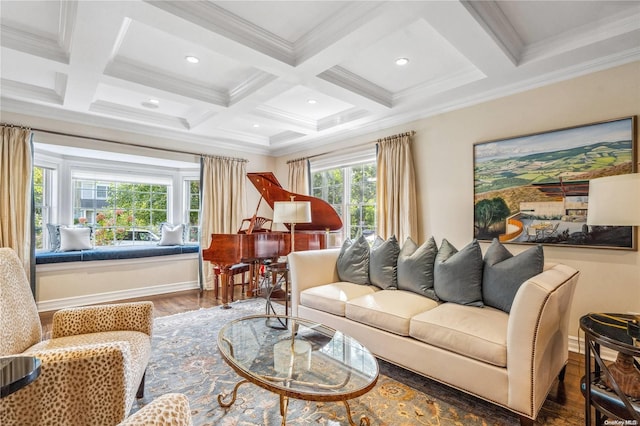 living room with hardwood / wood-style floors, plenty of natural light, crown molding, and coffered ceiling