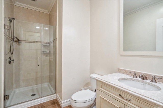 bathroom with vanity, tile patterned floors, crown molding, toilet, and a shower with shower door