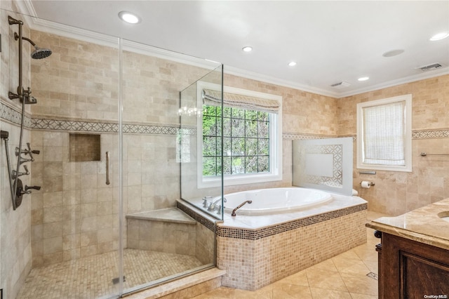 bathroom with vanity, tile patterned floors, ornamental molding, and separate shower and tub