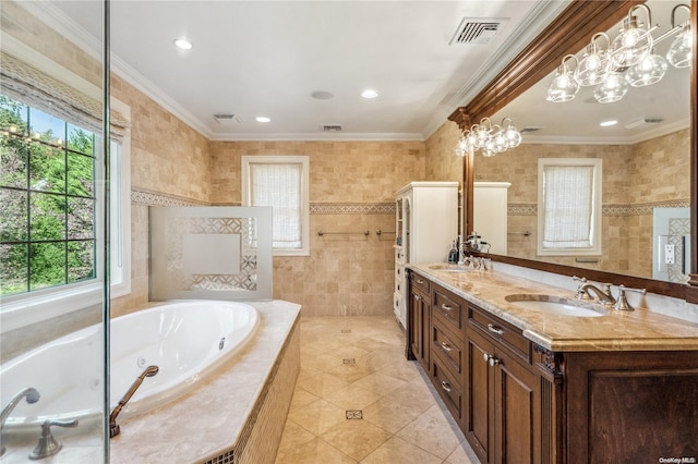 bathroom featuring vanity, ornamental molding, tile walls, and a wealth of natural light