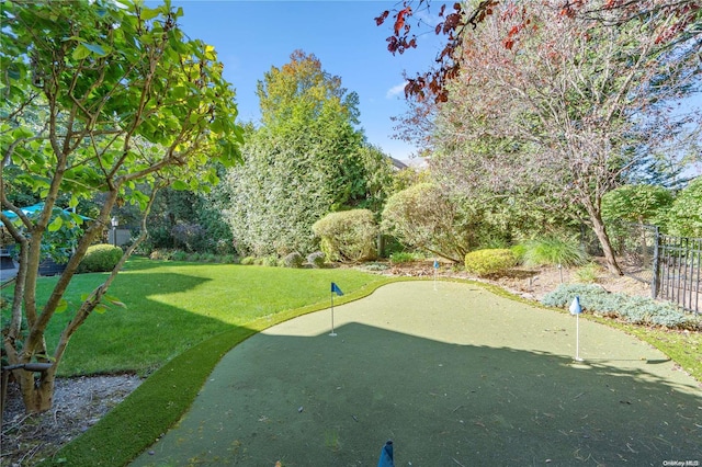 view of home's community with a lawn