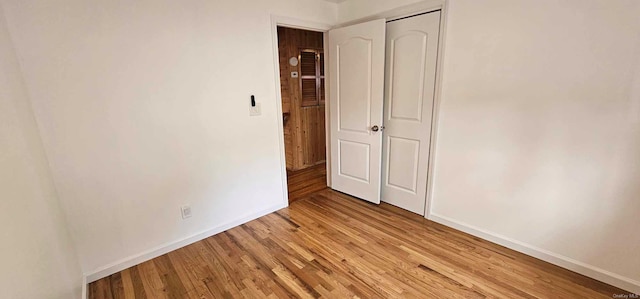 unfurnished bedroom with light hardwood / wood-style floors