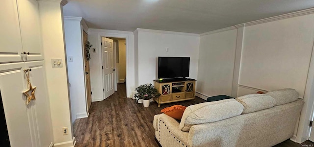 living room featuring ornamental molding, baseboard heating, and dark wood-type flooring