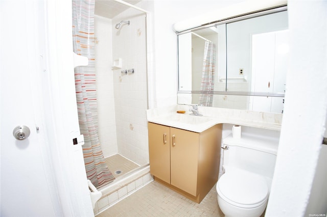 bathroom with a shower with shower curtain, vanity, toilet, and tile patterned flooring