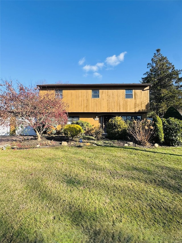 exterior space with a front yard