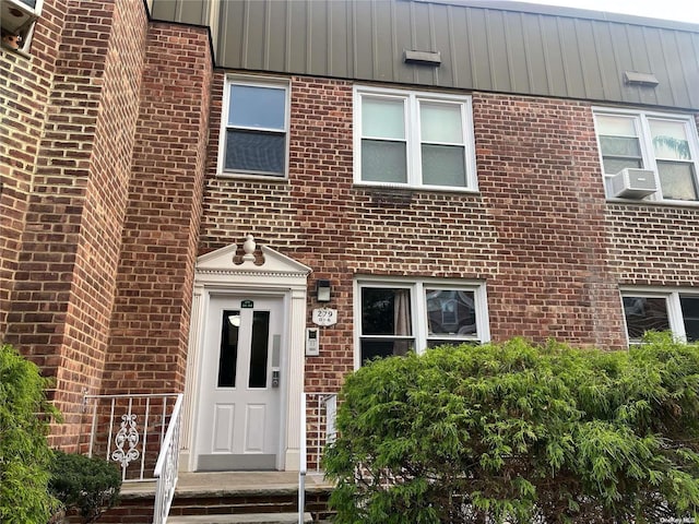 view of front of property with cooling unit