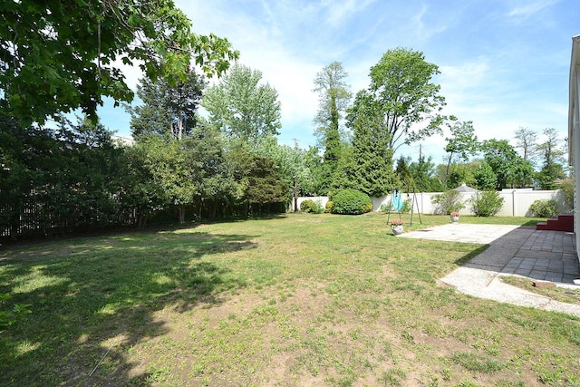 60 Tanglewood Dr, Smithtown, NY 11787 - view of yard featuring a patio area