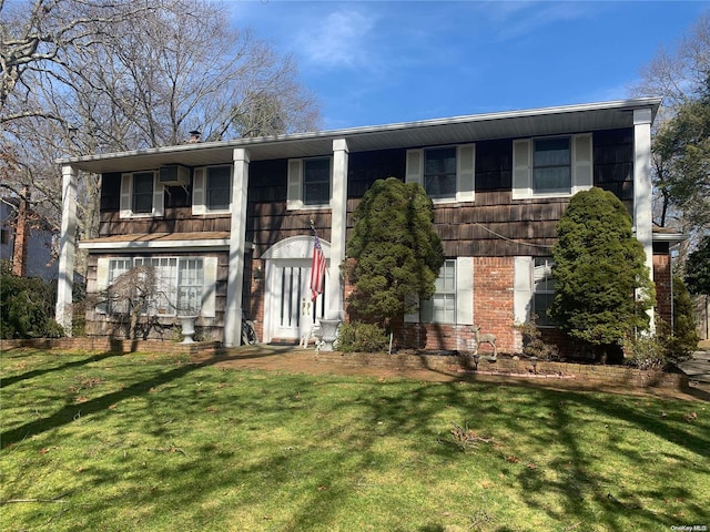 view of front of property with a front lawn