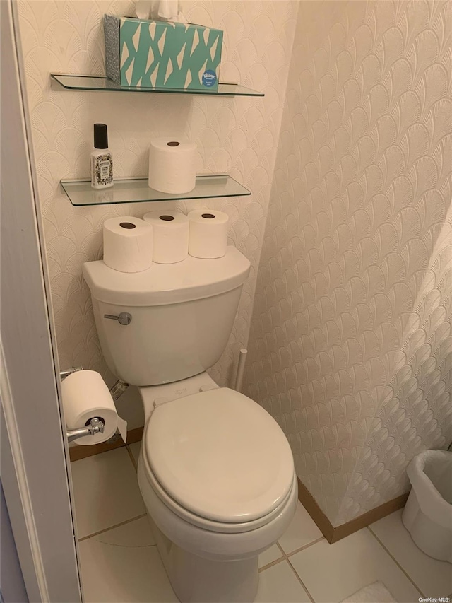 bathroom featuring tile patterned floors and toilet