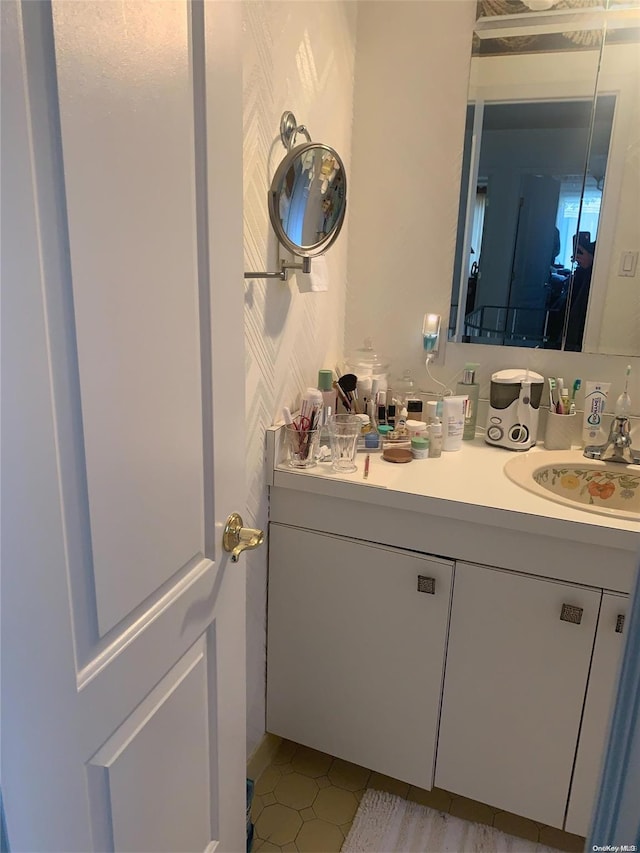 bathroom featuring vanity and tile patterned flooring