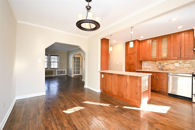 kitchen with ornamental molding, stainless steel dishwasher, decorative backsplash, dark hardwood / wood-style floors, and pendant lighting