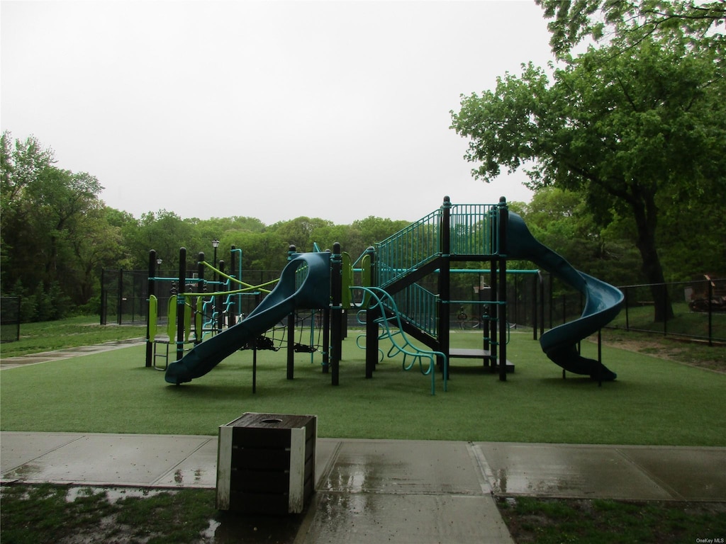 community play area with a yard