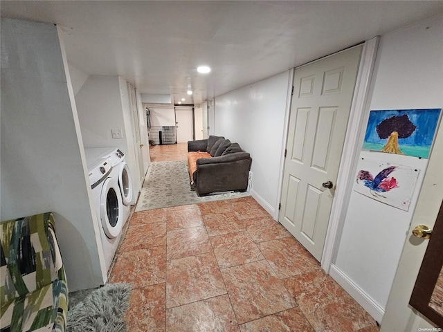 laundry area with independent washer and dryer