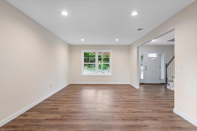 foyer entrance featuring wood-type flooring