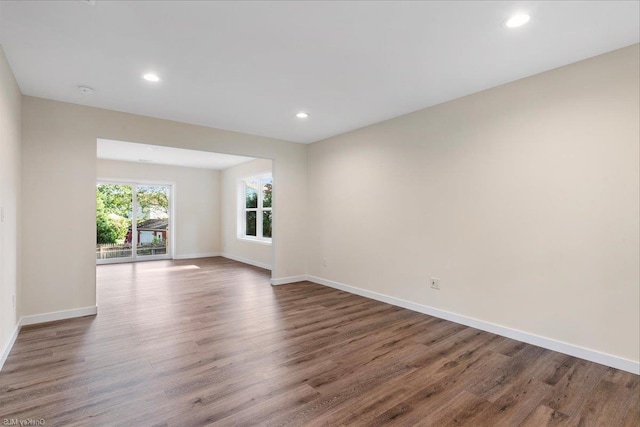 spare room featuring dark hardwood / wood-style floors