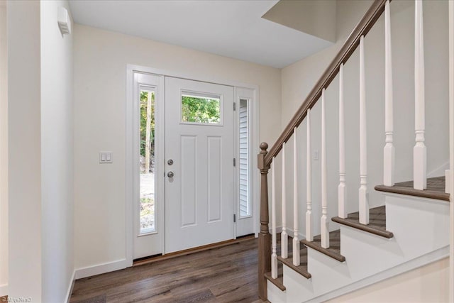 entrance foyer featuring dark hardwood / wood-style floors