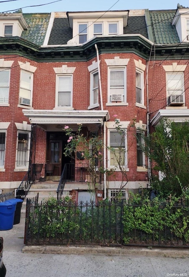 776 Hewitt, Bronx, NY 10455 - victorian home with brick siding and a fenced front yard