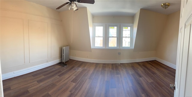 776 Hewitt, Bronx, NY 10455 - empty room with baseboards, radiator heating unit, ceiling fan, and dark wood-style flooring