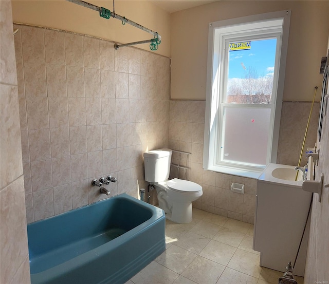 776 Hewitt, Bronx, NY 10455 - full bath with tile patterned floors, toilet, tile walls, and vanity