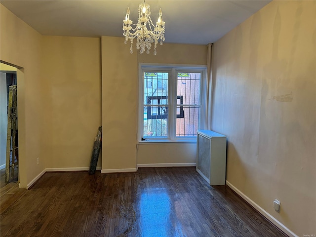 776 Hewitt, Bronx, NY 10455 - empty room with baseboards, a notable chandelier, and dark wood finished floors