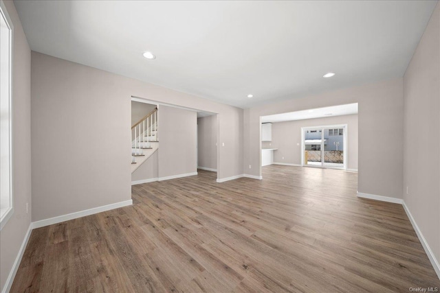 unfurnished room featuring light hardwood / wood-style flooring