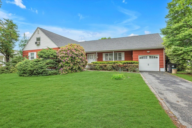 1519 Saint Louis Ave, Bay Shore, NY 11706 - view of front facade with a garage, driveway, a front lawn, and roof with shingles