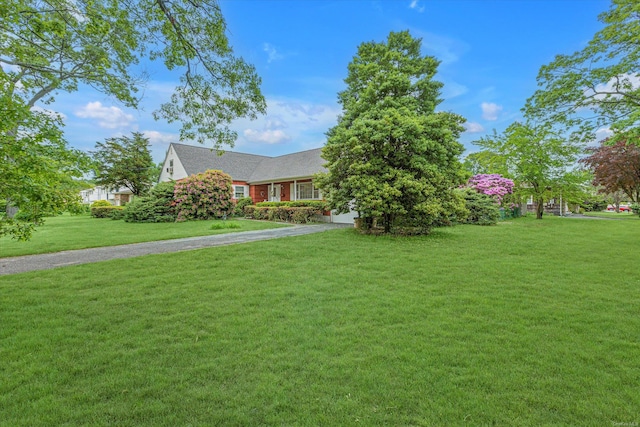 1519 Saint Louis Ave, Bay Shore, NY 11706 - view of front of home featuring a front yard