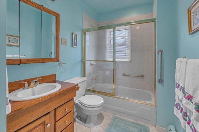 1519 Saint Louis Ave, Bay Shore, NY 11706 - full bath with toilet, vanity, bath / shower combo with glass door, tile patterned floors, and a baseboard radiator