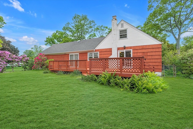 1519 Saint Louis Ave, Bay Shore, NY 11706 - back of house with a wooden deck and a chimney