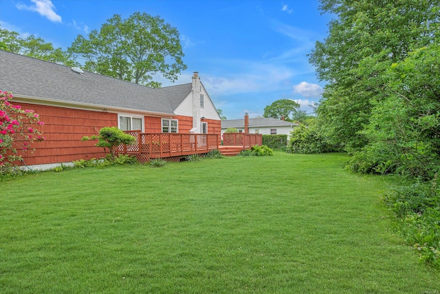 1519 Saint Louis Ave, Bay Shore, NY 11706 - view of green lawn featuring a deck