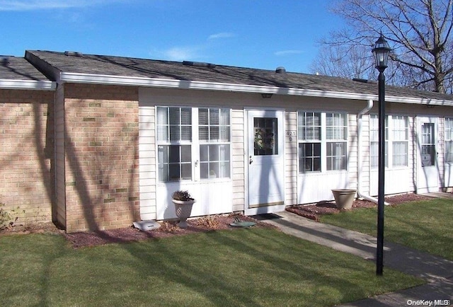 exterior space featuring a front yard