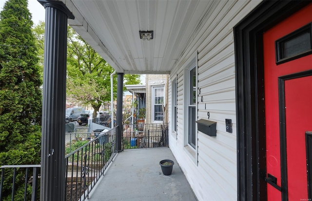 view of patio featuring a porch