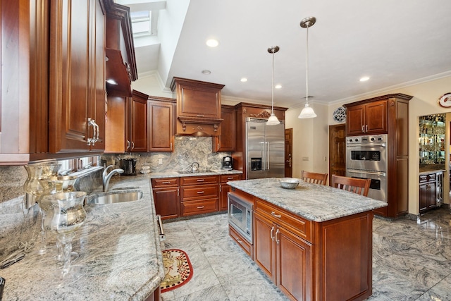 kitchen featuring tasteful backsplash, built in appliances, a center island, light stone countertops, and a sink