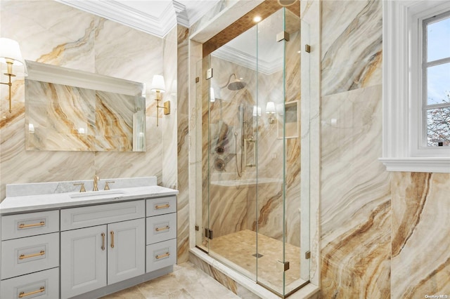 bathroom featuring vanity, tile walls, ornamental molding, and a shower with shower door