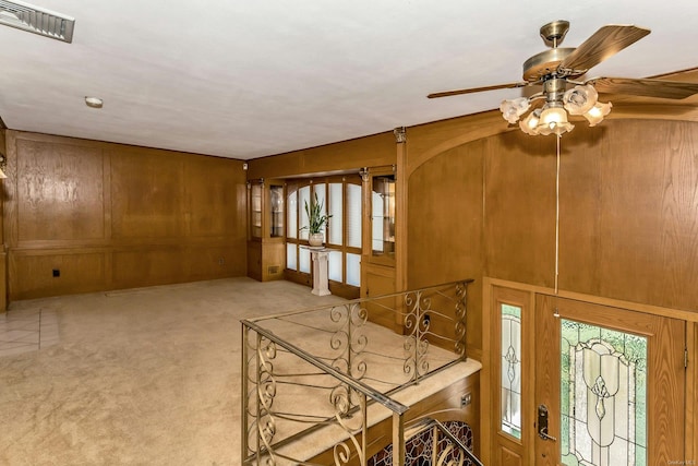 interior space featuring wood walls