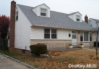 view of cape cod-style house