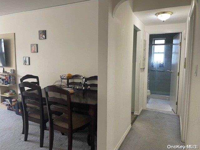 view of carpeted dining area