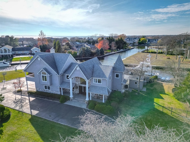 drone / aerial view featuring a water view