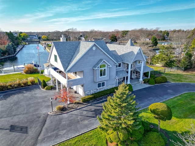 view of front of home featuring a water view