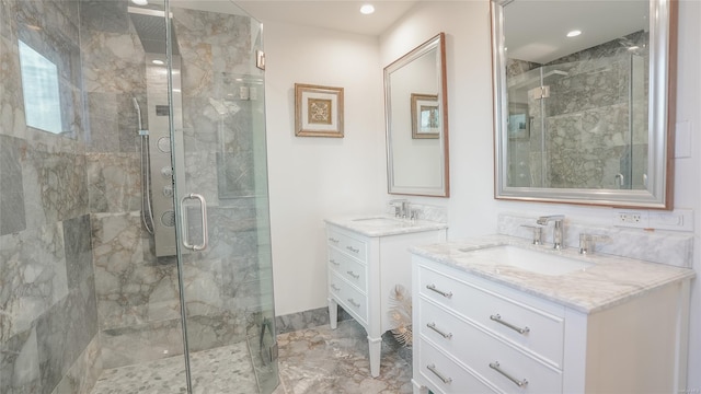 bathroom featuring vanity and an enclosed shower