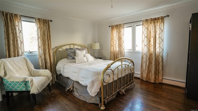 bedroom featuring crown molding, dark hardwood / wood-style flooring, and a baseboard radiator